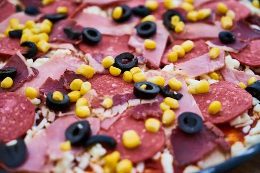 meat lovers pizza with multiple toppings