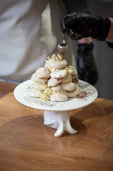 pastry chef decorating dessert